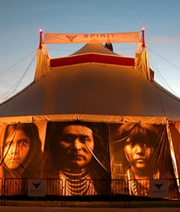 Tent showing indigenous faces